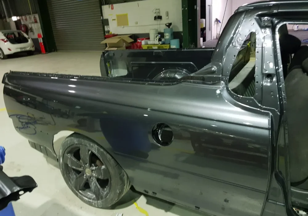 Panel beating and body repair work on vehicle at Redland Bay workshop
