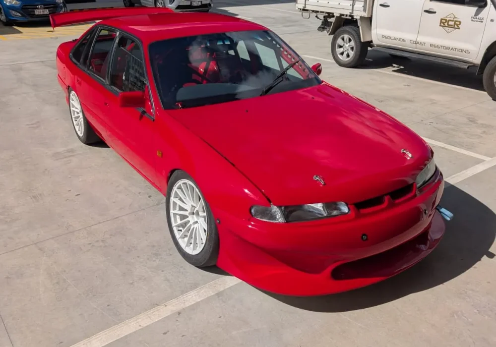 Final automotive refinishing result with smooth paint finish